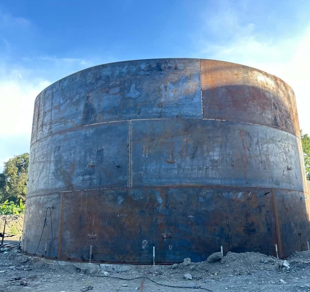 Large steel storage tank under construction